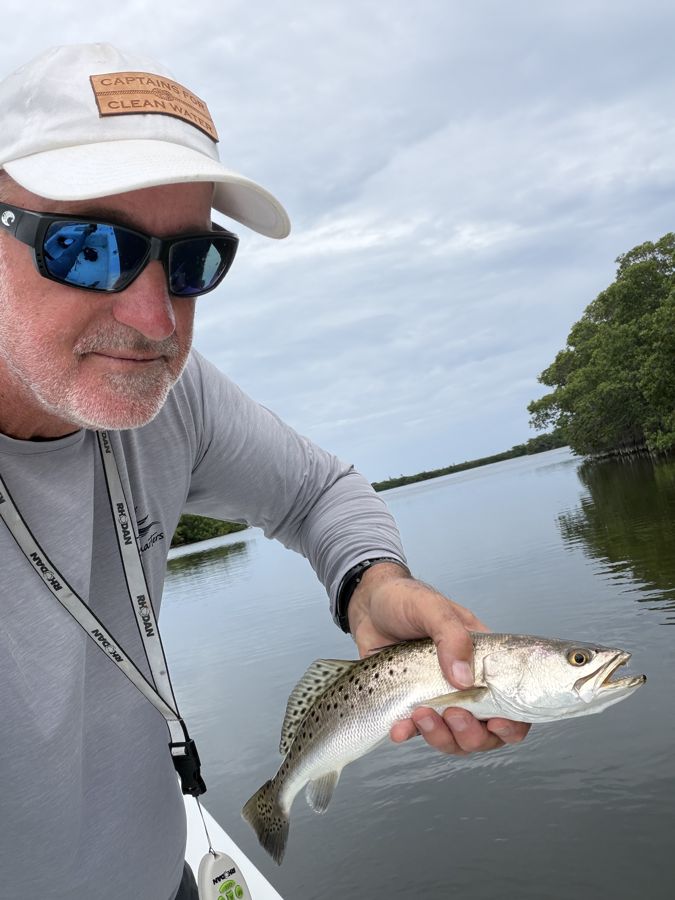 Captain Craig with a spotted seatrout on the Banana River Lagoon